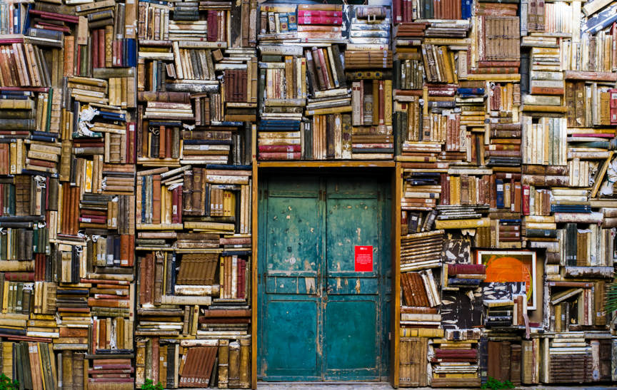 Image of books and a door